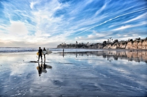 ocean beach san diego with surfers low tide